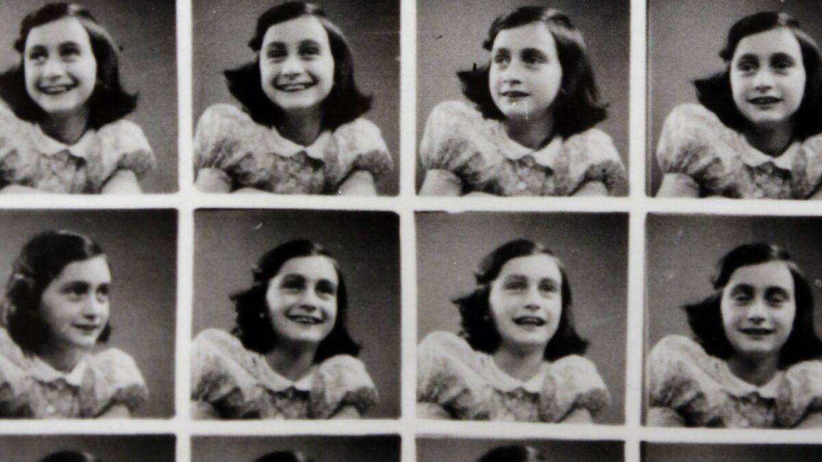 Part of a page of passport-sized photos taken of Anne Frank at a department store before she went into hiding in Amsterdam in 1942, displayed at the Museum of Tolerance in 2013.