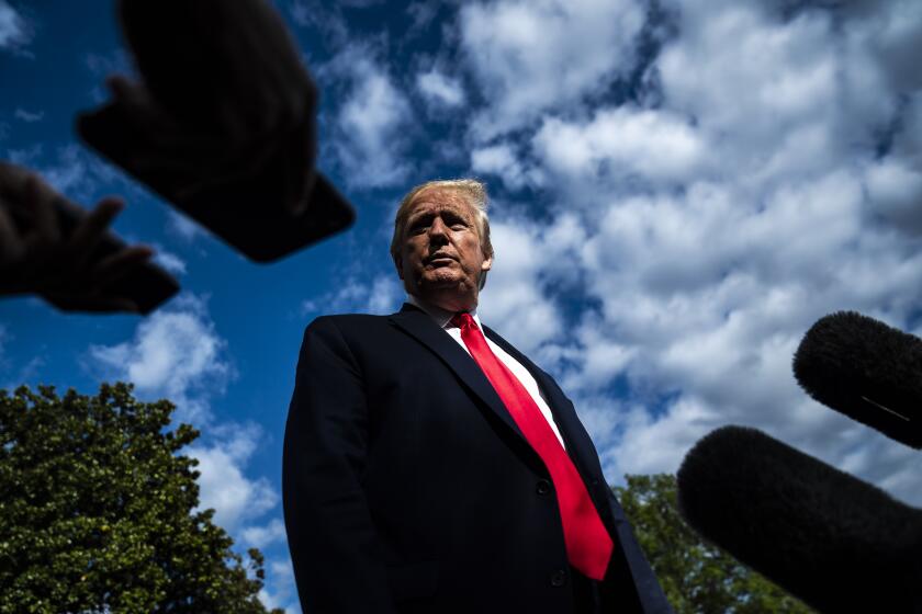 WASHINGTON, DC - MAY 1 : President Donald J. Trump stops to talk to reporters as he walks to board Marine One to travel to Camp David on the South Lawn at the White House on Friday, May 01, 2020 in Washington, DC. (Photo by Jabin Botsford/The Washington Post via Getty Images)