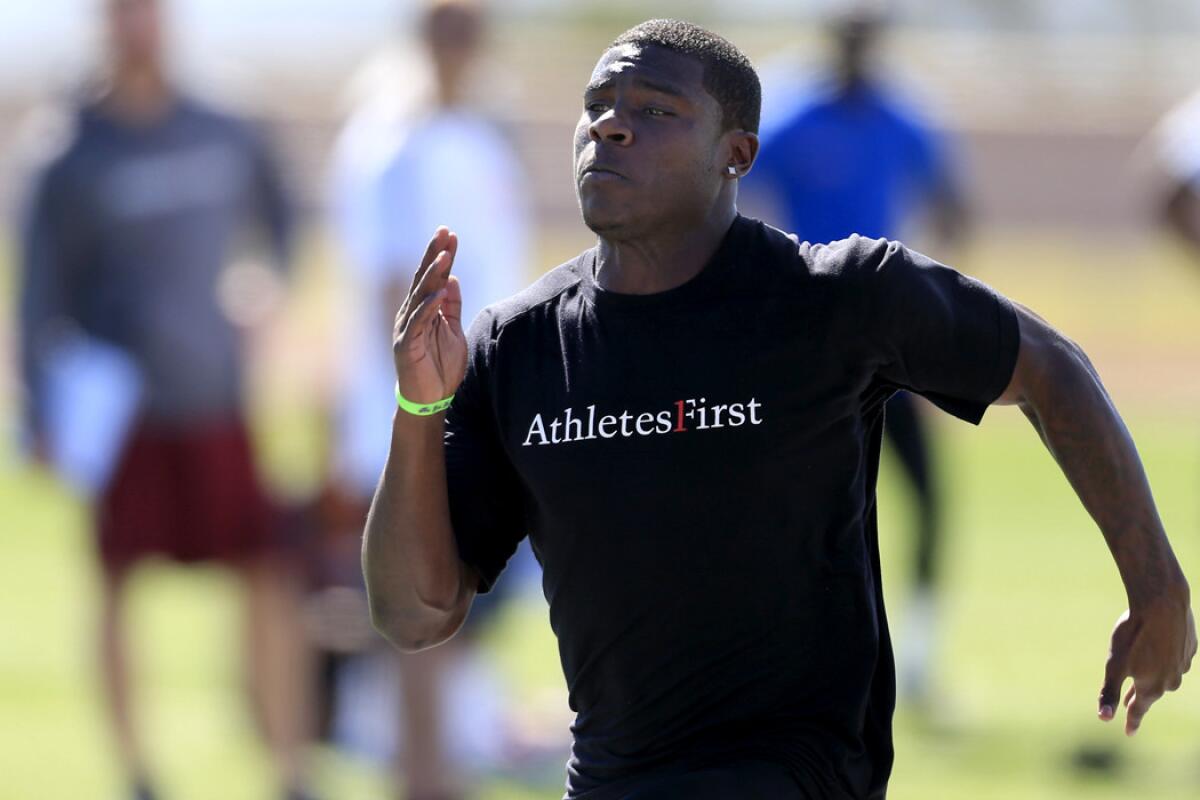 Dion Bailey runs a 40-yard dash in preparation for the NFL Combine last spring.