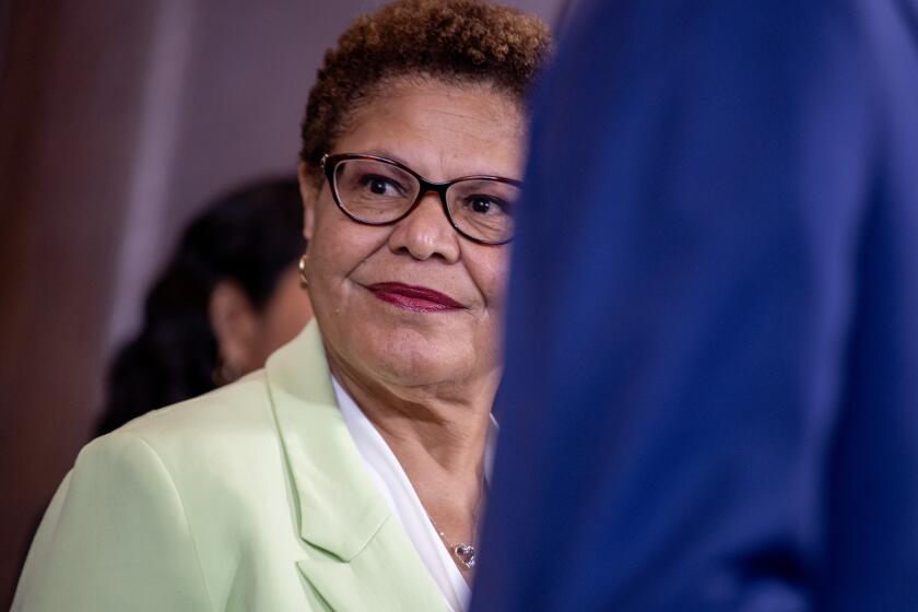Los Angeles, CA - July 31: Los Angeles Mayor Karen Bass waits to take the podium at a news conference to raise awareness for tenant rights, resources and investments ahead of the COVID rent debt repayment deadline on Aug. 1 at City Hall on Monday, July 31, 2023 in Los Angeles, CA. (Brian van der Brug / Los Angeles Times)