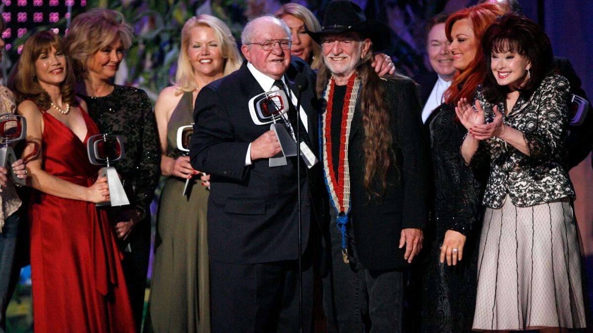 Sam Lovullo, center left, with Willie Nelson and members of the "Hee-Haw" cast in 2007.