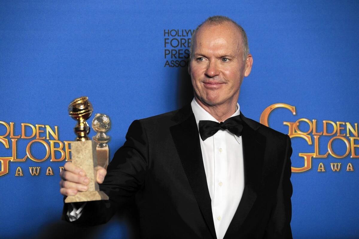 Michael Keaton with his for actor in a drama or comedy at the 72nd annual Golden Globe Awards show at the Beverly Hilton Hotel on Jan. 11, 2015.