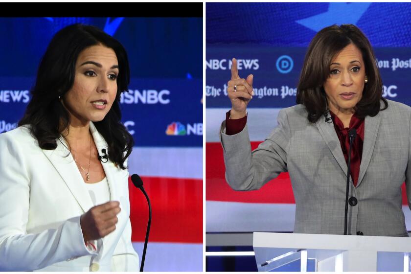 Democratic presidential hopefulsTulsi Gabbard and Kamala Harris during the the fifth Democratic primary debate of the 2020 presidential campaign season.