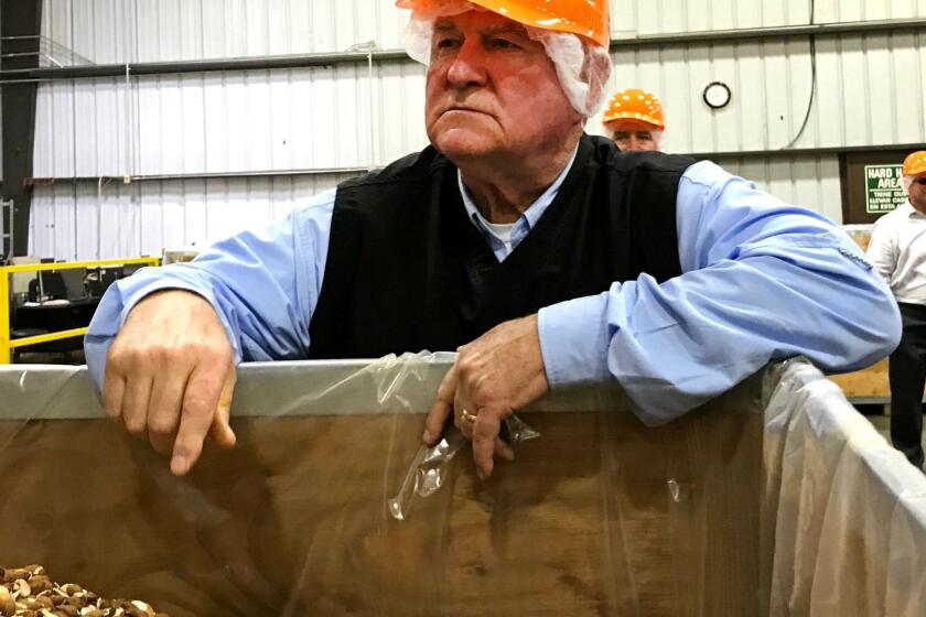 Agriculture Secretary Sonny Perdue at the Harris-Woolf Almonds processing plant in Coalinga, Calif., during a tour on Feb. 14, 2018. (Geoffrey Mohan / Los Angeles Times)