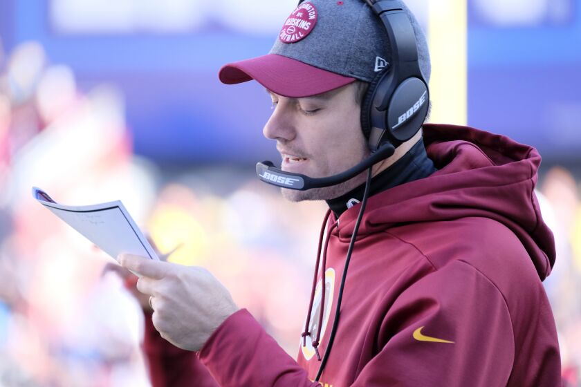 Washington Redskins offensive coordinator Kevin O'Connell calls a play.
