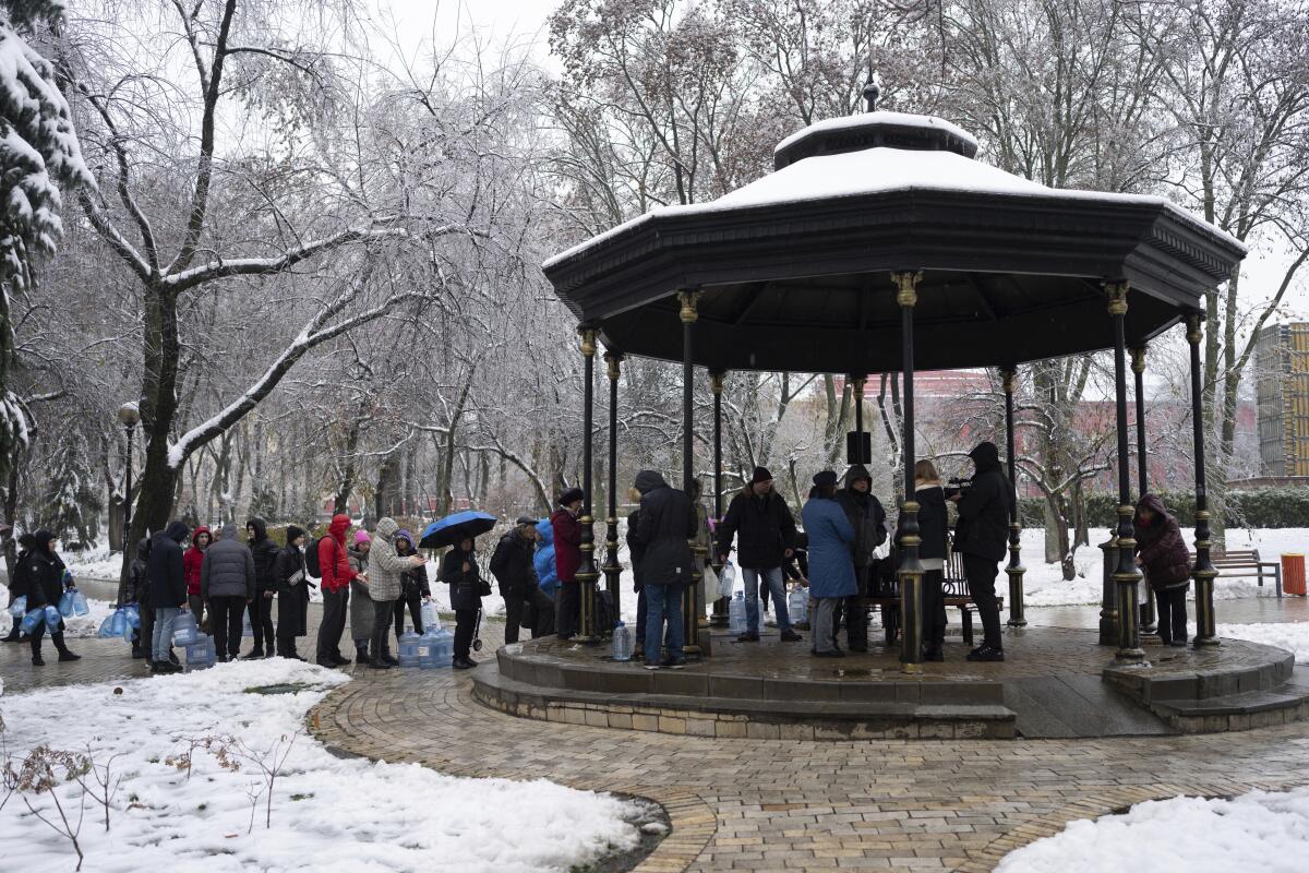 People lining up to collect water in Kyiv, Ukraine