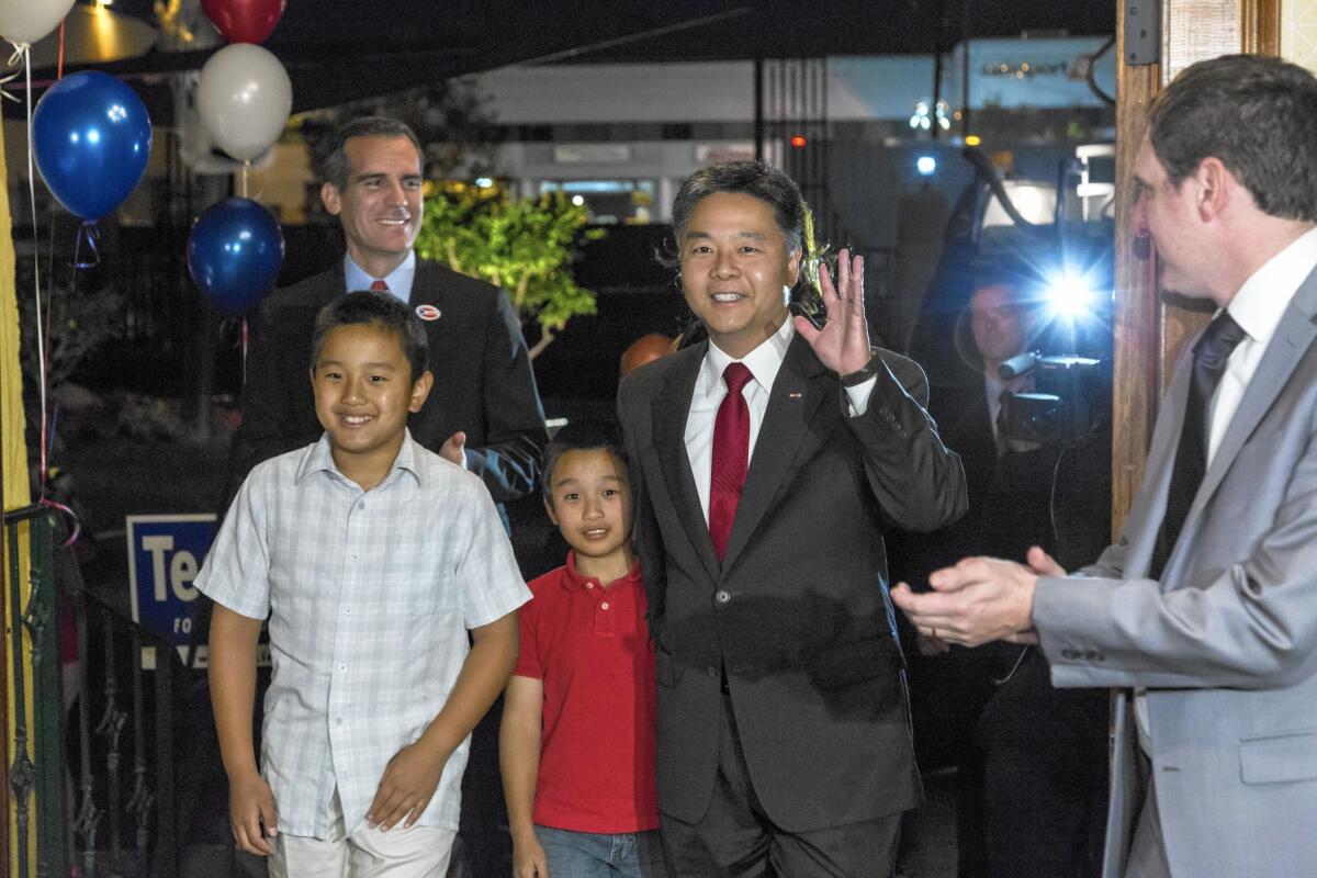 Torrance Democrat Ted Lieu on election night with his family and L.A. Mayor Eric Garcetti, rear. Returns showed Lieu well ahead in his U.S. House race.
