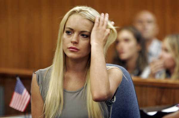 In July 2010, the former child star was sentenced to 90 days at the Century Regional Detention Facility in Lynwood, Calif., to be followed by 90 days in rehab, for violating her probation related to her 2007 DUI convictions. (Lohan actually served 13 days in jail and 23 days in rehab.) Out on probation, she failed two mandatory drug tests and was hauled back into court. After fighting to make bail, she voluntarily checked into Betty Ford until her next sentencing date -- at which point, the judge sent her back to the Betty Ford clinic until January 2011. The 2007 probation was part of a plea deal she agreed to after being arrested twice in less than two months (once after a short car chase). She spent 84 minutes in jail in 2007 after pleading either guilty or no contest on counts of reckless driving and driving under the influence of cocaine and alcohol; her 18-month probation was extended in 2009 after she had problems showing up on time for court. After she was released from the Betty Ford Clinic (a stay that was not without its own bit of scandal), Lohan found herself with a felony grand theft charge stemming from a necklace allegedly taken from a Venice, Calif., boutique (it didn't help that paparazzi photos showed her wearing the missing item). Lohan plead 'not guilty' to these charges on Feb. 9. and was later sentenced to four months in jail and 480 hours of community service. However, Lohan did 35 days of home detention in lieu of a 120-jail sentence because of jail overcrowding. She was released from house arrest in June 2011.