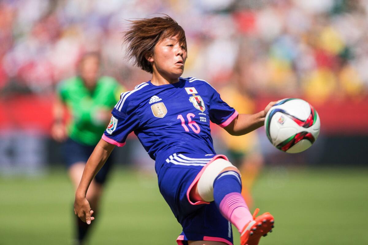 Japan's Mana Iwabuchi kicks the ball during a quarterfinal match against Australia on June 27 in Edmonton, Canada.