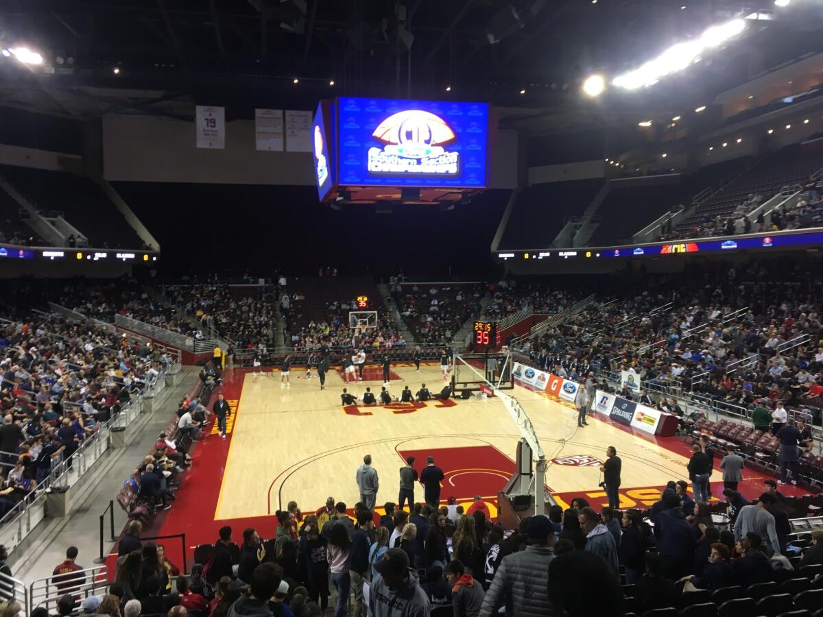 Fans filling in to sold-out Galen Center for high school basketball.