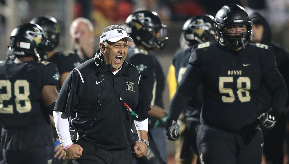 Narbonne coach Manuel Douglas reacts after Gauchos defensive end Dominic Peterson recovered a Dorsey fumble in the end zone for a touchdwon during the 2016 City Section Open Division championship game at El Camino College.