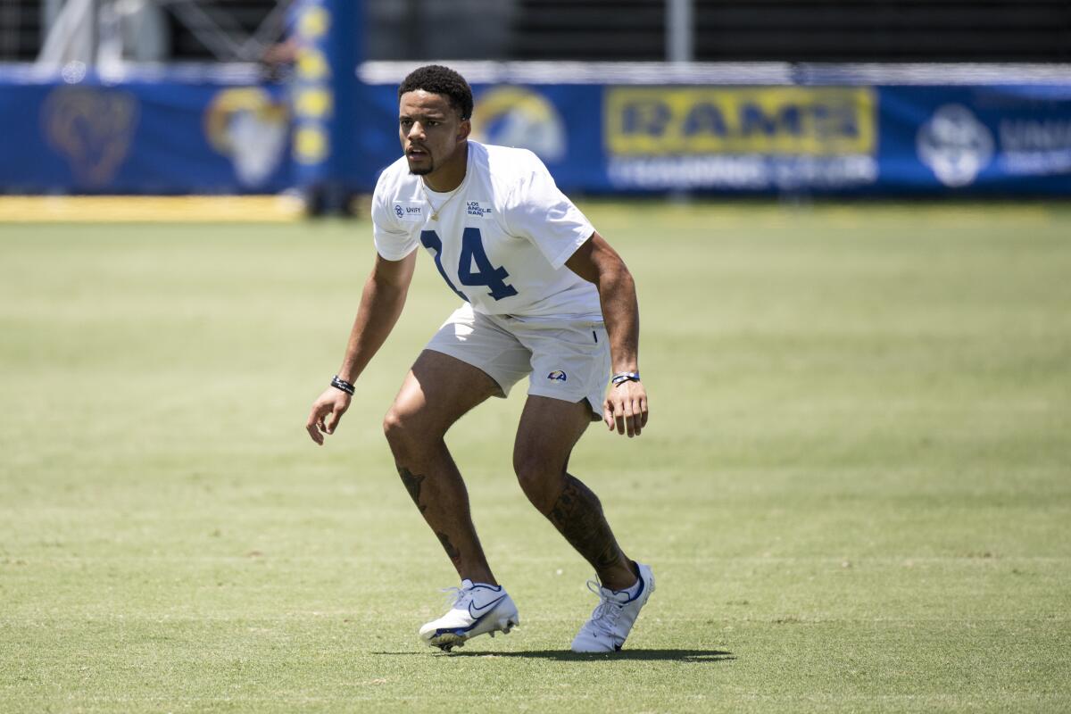 Rams rookie corner Decobie Durant backpedals into position at practice.