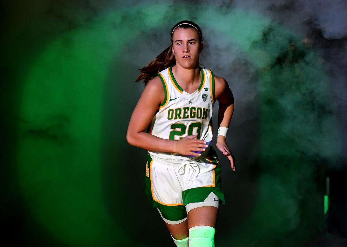 Oregon star Sabrina Ionescu is introduced before the championship game of the Pac-12 Conference tournament on March 8, 2020, in Las Vegas.