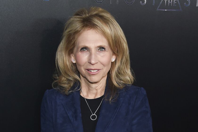 FILE- In this March 29, 2017, file photo, Shari Redstone attends the premiere of "Ghost in the Shell" at AMC Loews Lincoln Square in New York. CBS is suing its controlling shareholder as part of its long-running attempt to avoid a combination with Viacom. The majority shareholder of both companies is National Amusements. The holding company is run by Shari Redstone, the daughter of media mogul Sumner Redstone. (Photo by Evan Agostini/Invision/AP, File)