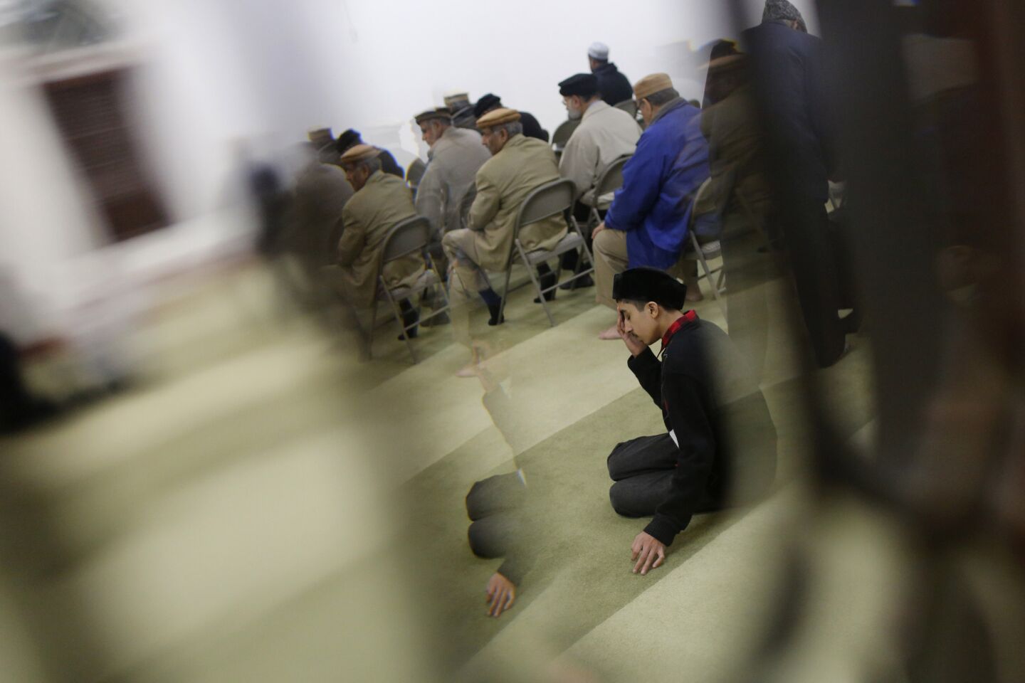 The Ahmadiyya Muslim Community USA holds a news conference and prayer vigil Dec. 3, 2015, at Baitul Hameed Mosque in Chino, Calif. The group denounced the massacre.