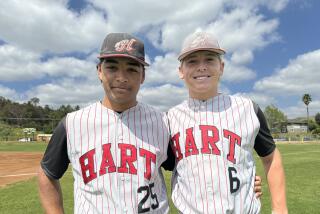 Left-hander Tristan Purfoy (left) and right-hander Ian Edwards both throw submarine-style for Hart.