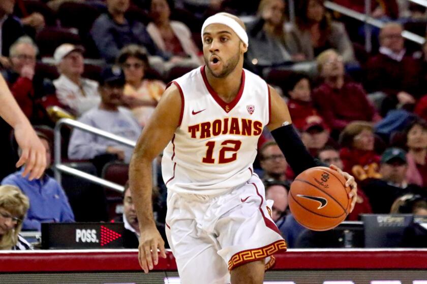 USC guard Julian Jacobs drives to the basket against Cal Poly on Dec. 17.