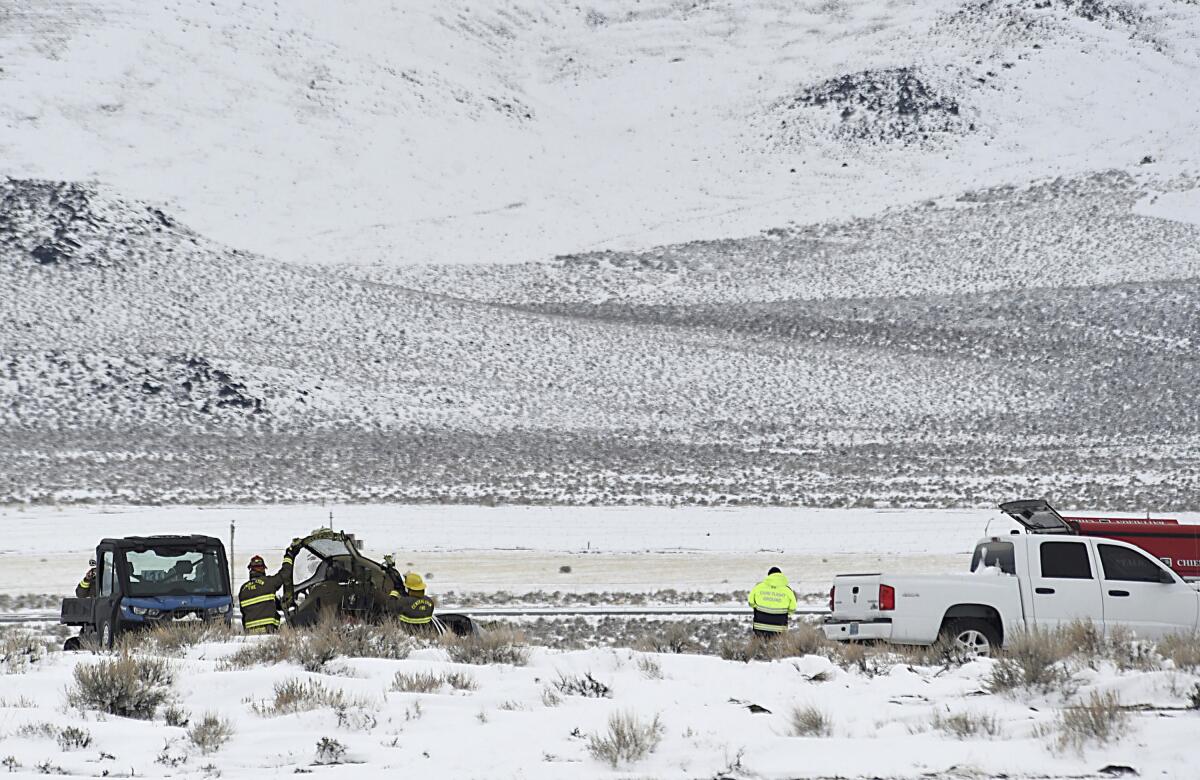 Wreckage of plane amid snow