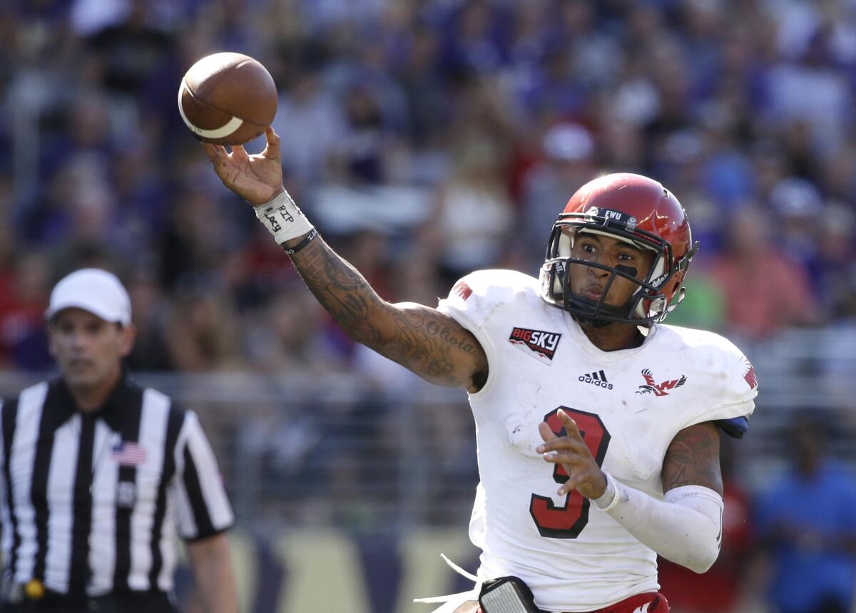 Eastern Washington quarterback Vernon Adams Jr. passed for a school-record seven touchdowns and a career-high 475 yards Saturday during a 59-52 loss to Washington.