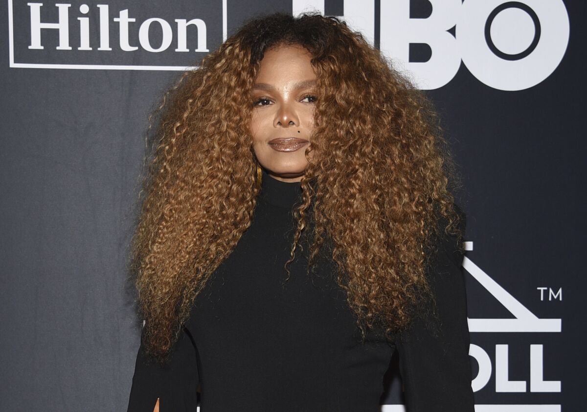 FILE - Janet Jackson arrives at the Rock & Roll Hall of Fame induction ceremony in New York on March 29, 2019. This past weekend's Janet Jackson documentary was the most popular non-fiction show on Lifetime since its 'Surviving R. Kelly' documentary three years ago. The Nielsen company said roughly 4 million people watched on live television, digitally or on demand in the first few days it was out, numbers that are only expected to grow. (Photo by Evan Agostini/Invision/AP, File)