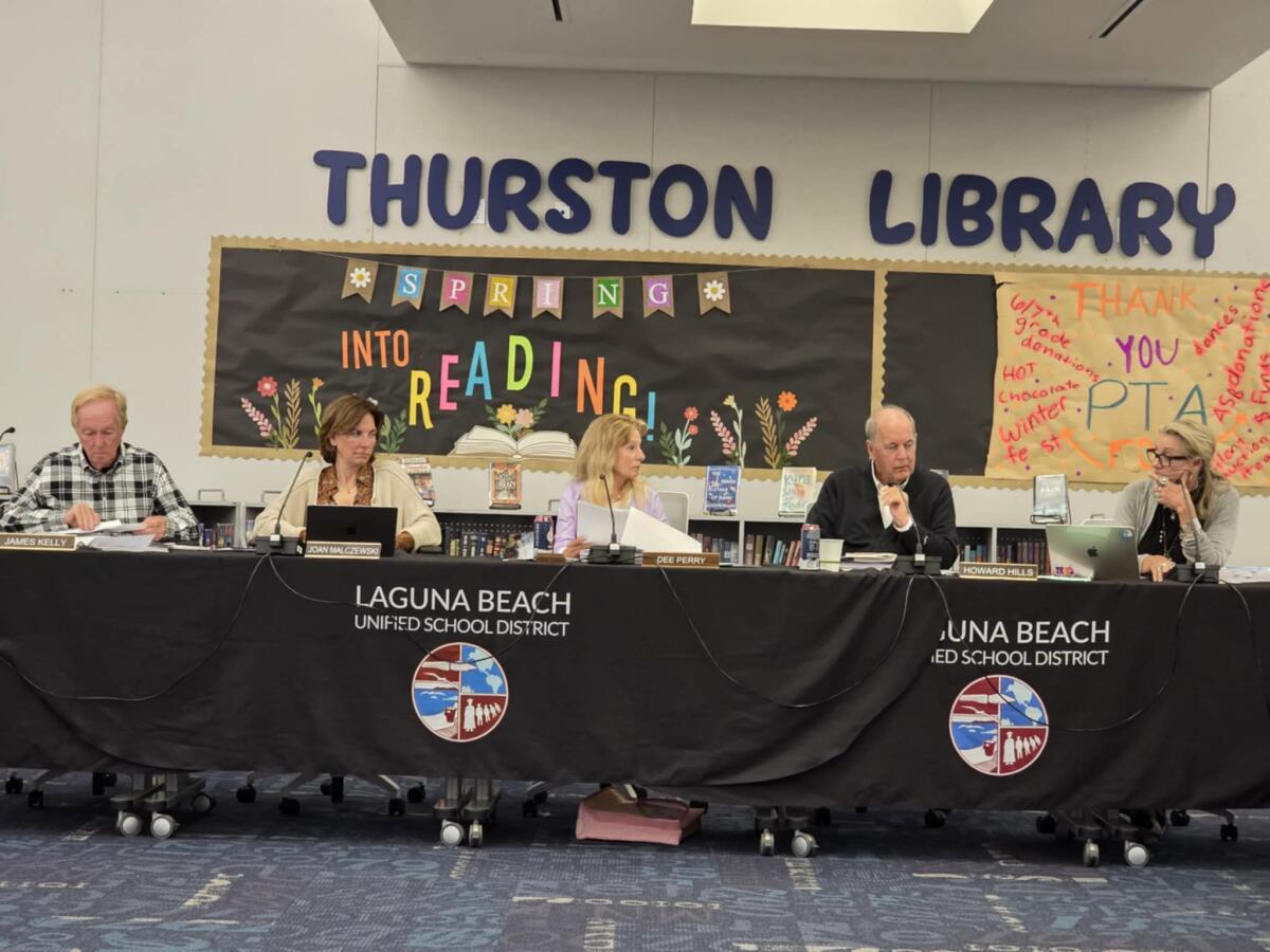 The Laguna Beach Unified School District board of education meets in the library at Thurston Middle School.