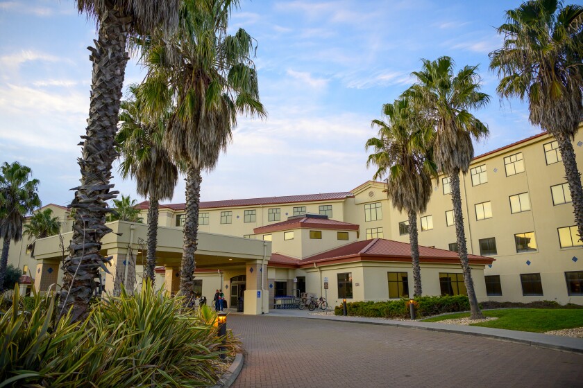 The Westwind Inn lodging facility at Travis Air Force Base, Calif., where some Americans evacuated from China amid the coronavirus outbreak were quarantined A government whistleblower has filed a complaint alleging that federal workers did not have the necessary protective gear.
