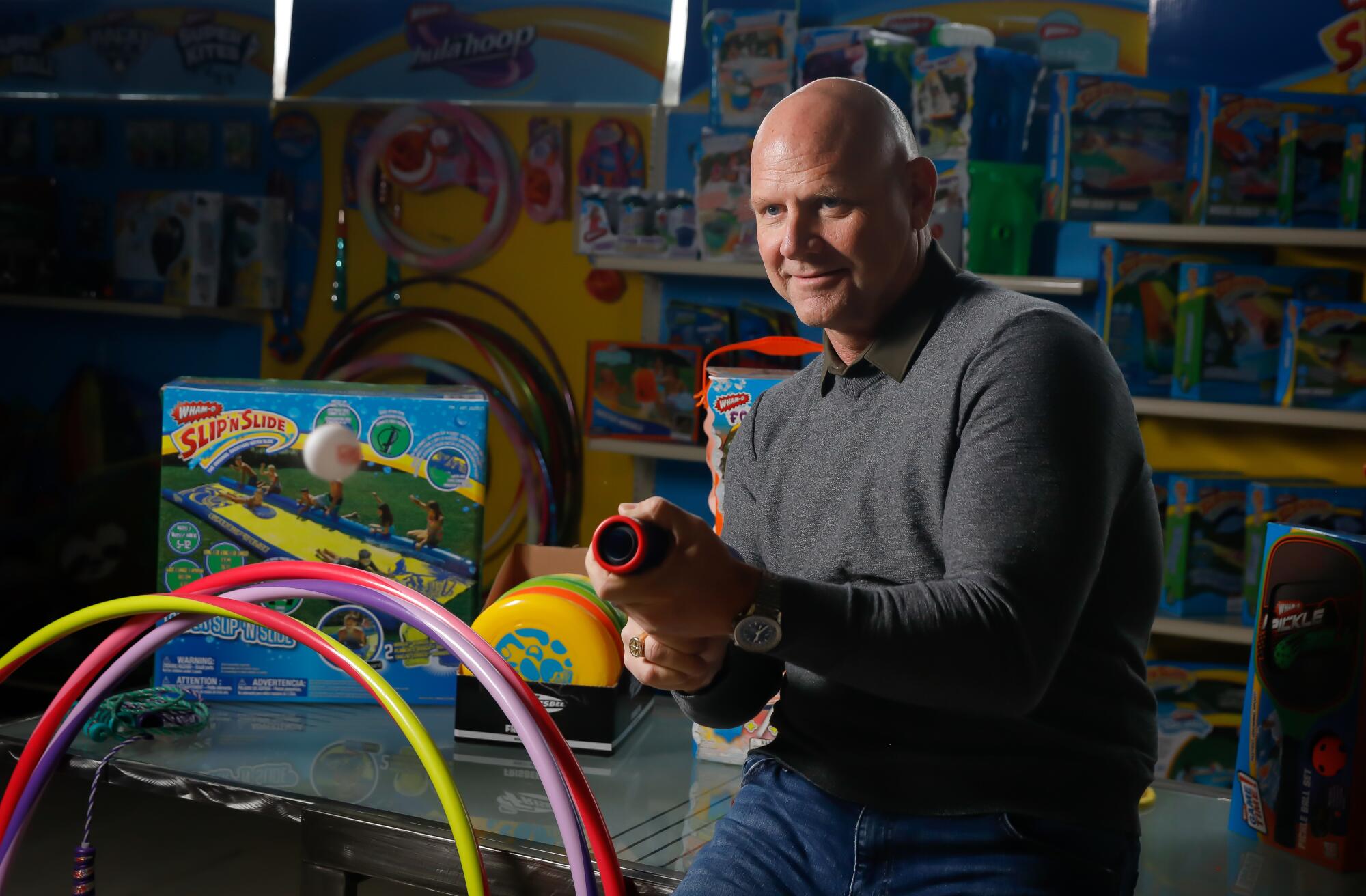 Wham-O president Todd Richards with toys 