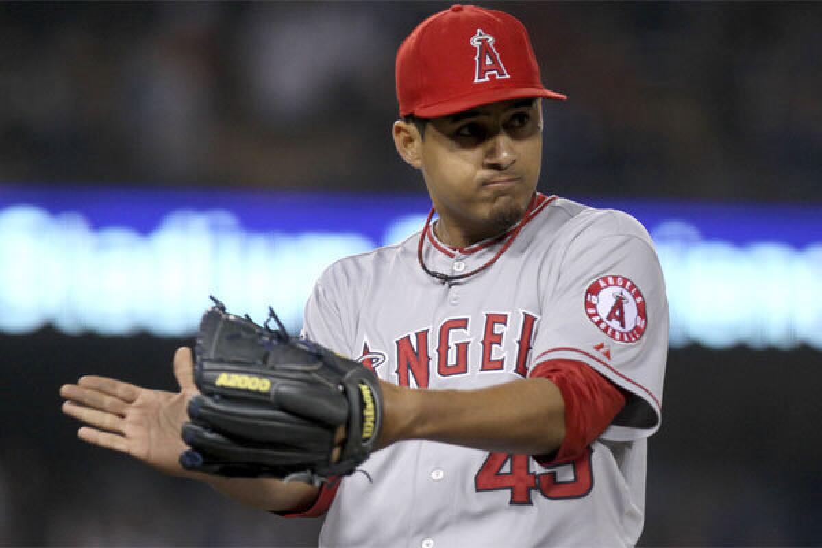 Angels closer Ernesto Frieri reacts after picking up the save against the Dodgers in June 2012.