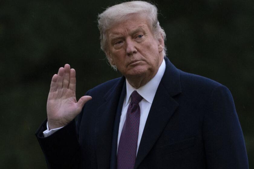 President Trump arrives at the White House on Thursday after returning from Bedminster, N.J.