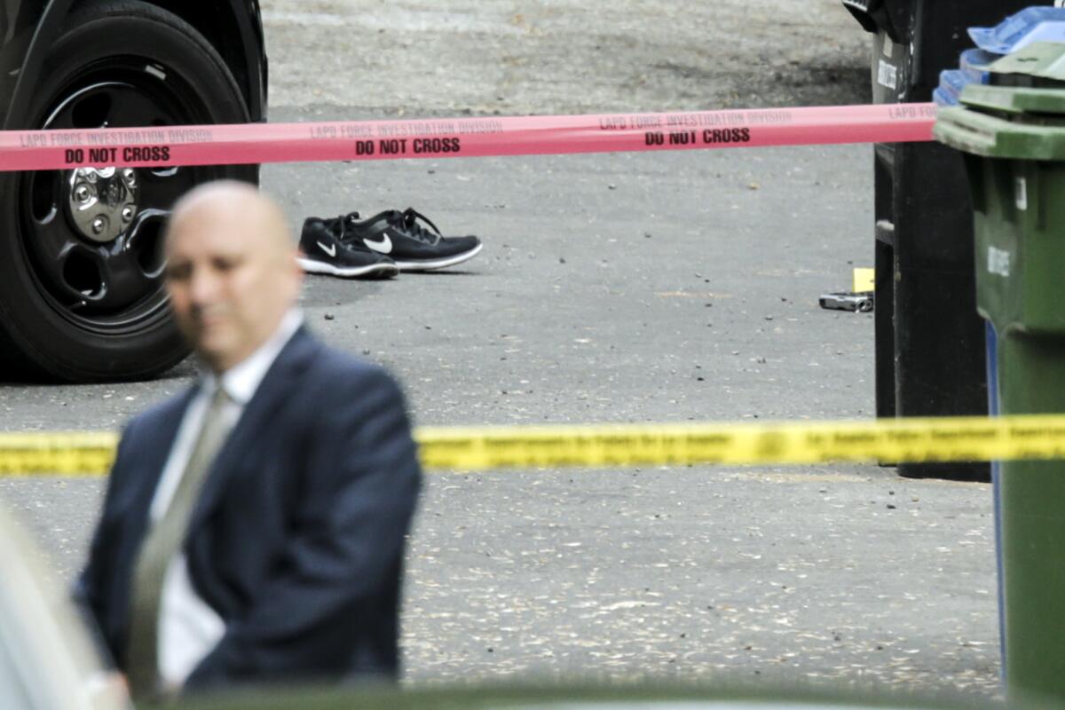 Investigators process the scene of an LAPD officer-involved shooting Tuesday morning in Eagle Rock.