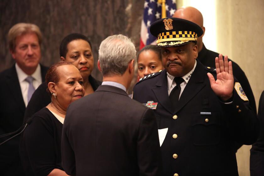 Surrounded by family, Eddie Johnson is sworn in as the new Police Superintendent by Mayor Rahm Emanuel on April 13, 2016.
