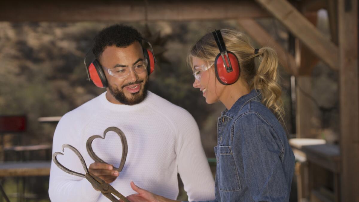 "Cosmic Love" dating show contestant Caleb McDonnell, a Pisces, explores his romantic connection to Phoebe Davis, a Leo.