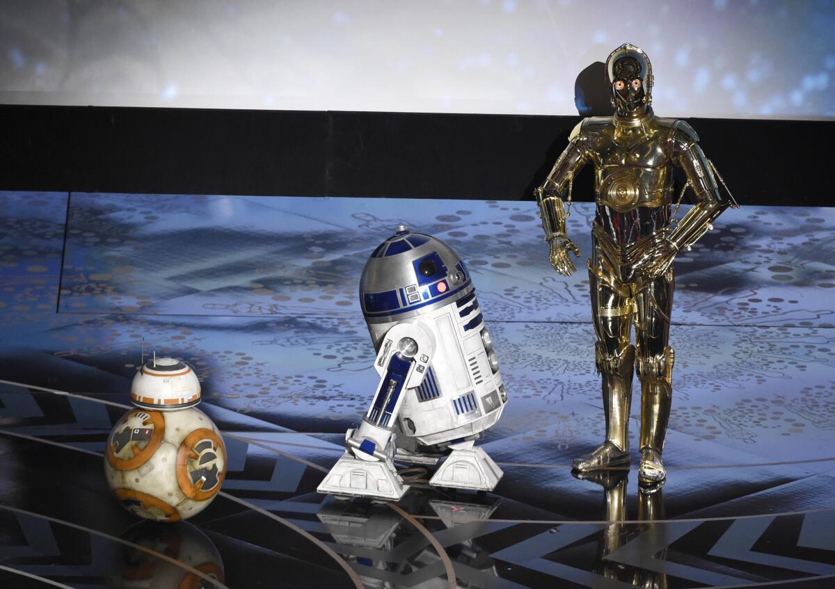 BB-8, R2-D2 and C-3PO onstage at the 88th Academy Awards ceremony.