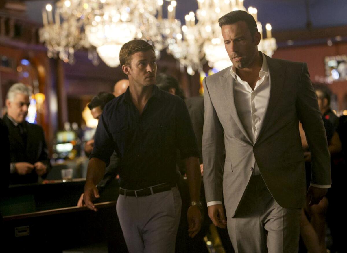 Justin Timberlake, left, and Ben Affleck in "Runner Runner."