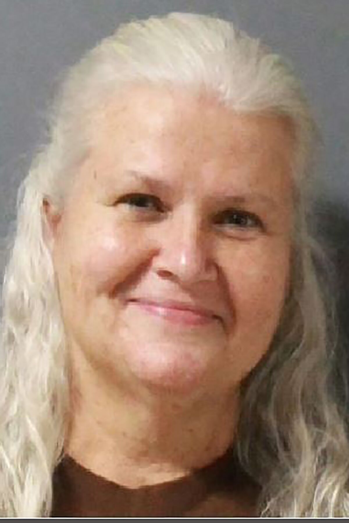 This undated photo provided by the Steele County, Minn., Jail shows Lois Riess. Riess a Minnesota woman who pleaded guilty to fatally shooting a woman in Florida so she could assume her identity has been returned to her home state to face trial on allegations that she killed her husband in 2018. Lois Riess is being held at the Steele County Detention Center in Owatonna, Minn., on charges of first- and second-degree murder. She's accused of fatally shooting David Riess at their home in Blooming Prairie in March 2018. (Steele County Jail via AP)