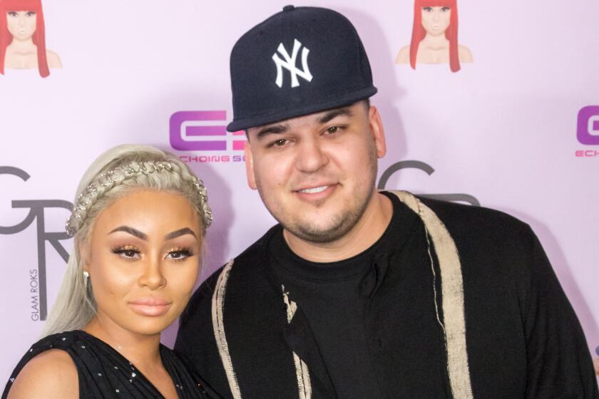 Rob Kardashian and Blac Chyna arrive at her Blac Chyna Birthday Celebration And Unveiling Of Her "Chymoji" Emoji Collection at the Hard Rock Cafe on May 10, 2016. E! announced Wednesday it was producing a reality show starring the pair.