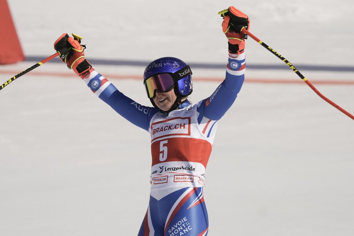 France's Tessa Worley celebrates winning an alpine ski, women's World Cup giant slalom, in Lenzerheide, Switzerland, Sunday, March 6, 2022. (AP Photo/Giovanni Auletta)