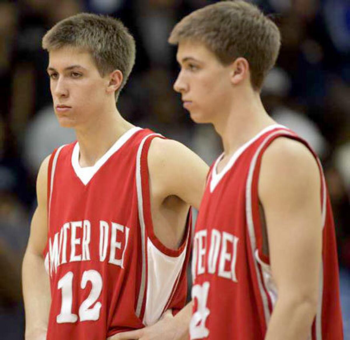 Identical twins David, left, and Travis Wear are sophomore starters at Mater Dei.