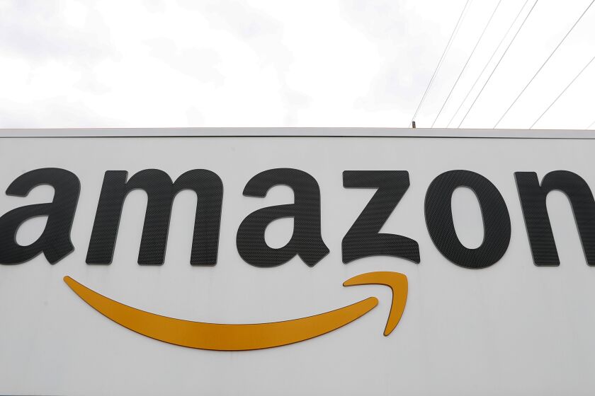 The Amazon DTW1 fulfillment center is shown in Romulus, Mich., April 1, 2020. Amazon reports financial earnings on Thursday, Feb. 2, 2023. (AP Photo/Paul Sancya)