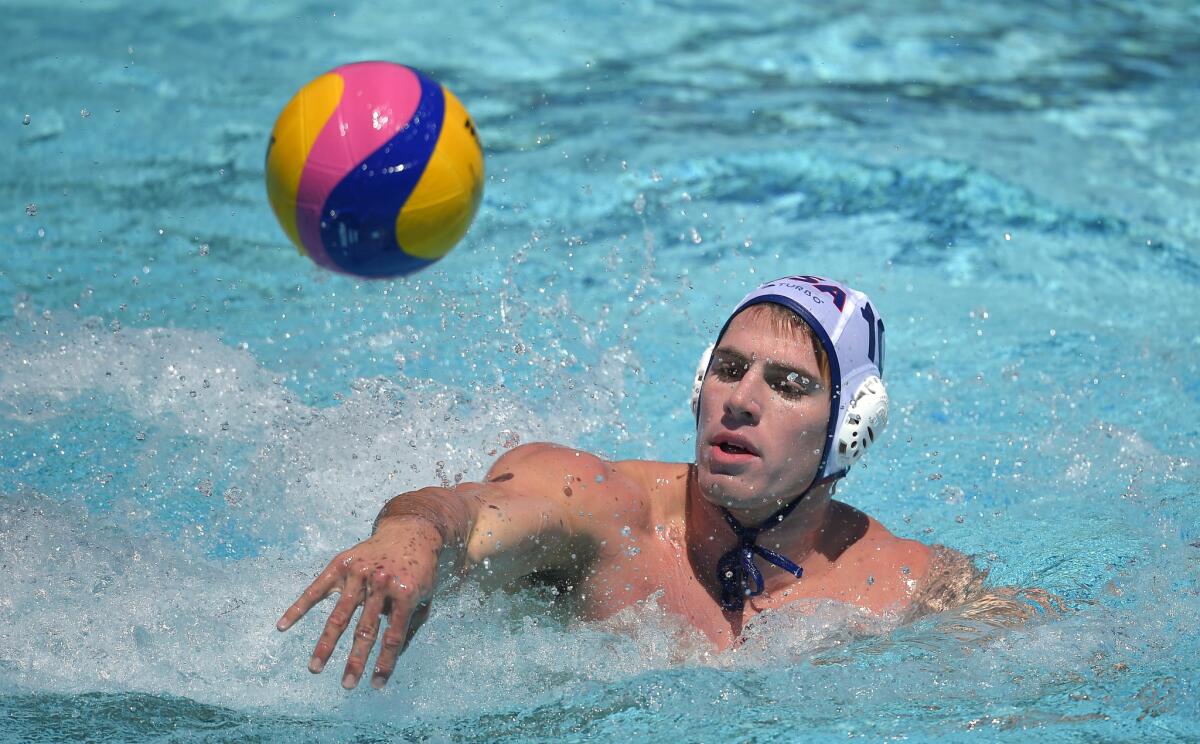 United States attacker Bret Bonanni passes the ball during a men's exhibition water polo match against Australia, Sunday, May 22, 2016, in Los Angeles.