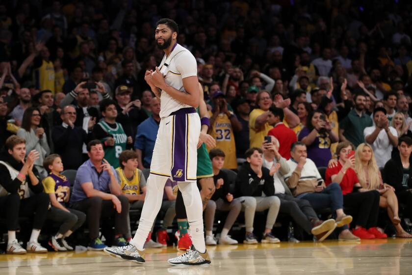 LOS ANGELES, CALIFORNIA - FEBRUARY 23: Anthony Davis #3 of the Los Angeles Lakers reacts to a play during the fourth quarter against the Boston Celtics at Staples Center on February 23, 2020 in Los Angeles, California. The Lakers won 114-112. (Photo by Katelyn Mulcahy/Getty Images)