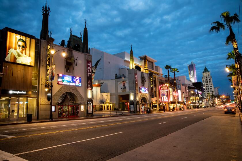 HOLLYWOOD, CA --MARCH 20, 2020 - On the first Friday night of California Gov. Gavin Newsom's "Safter at Home," decree, it appeared to be working, as all is quiet along Hollywood Boulevard, near the TCL Chinese Theatre in Hollywood, CA, March 20, 2020. (Jay L. Clendenin / Los Angeles Times)