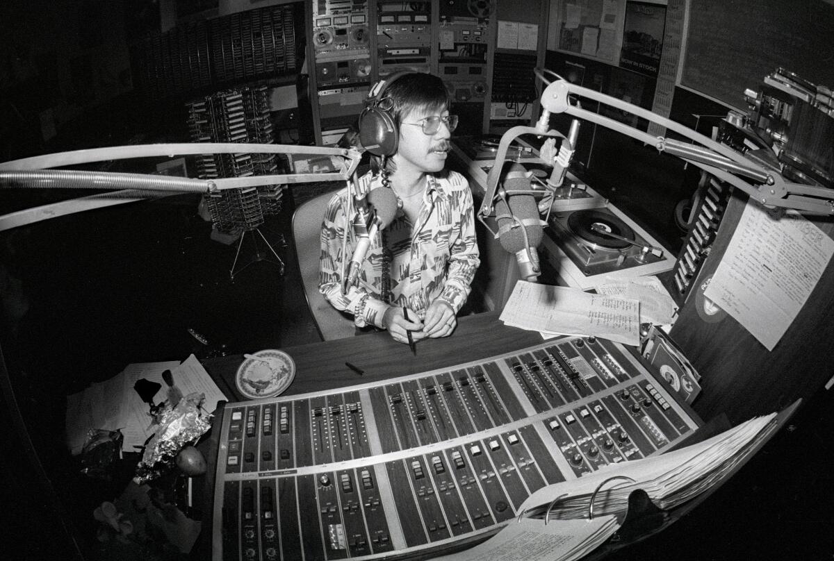 Ben Fong-Torres sits in a radio studio in the documentary "Like a Rolling Stone: The Life & Times of Ben Fong-Torres."