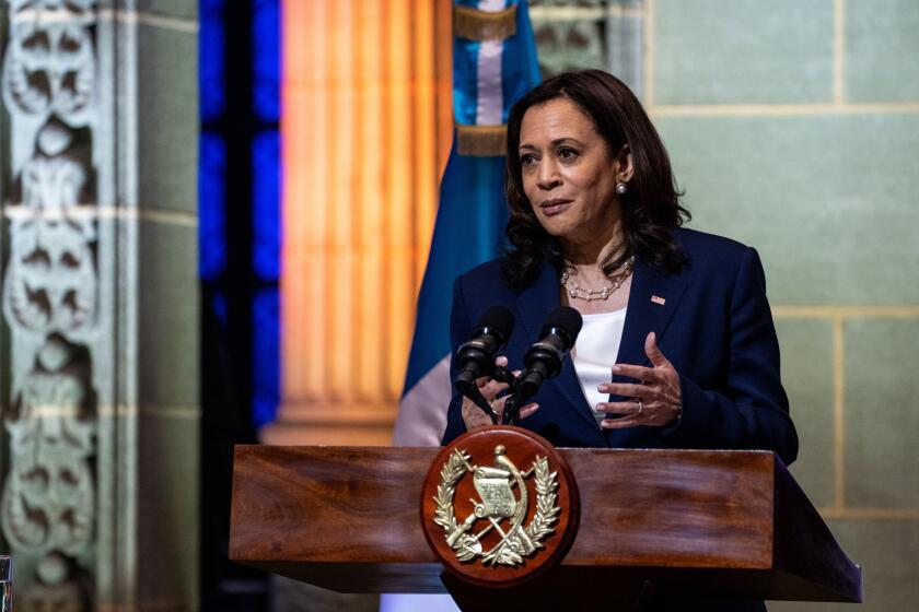 GUATEMALA CITY, GUATEMALA - JUNE 07: Vice President Kamala Harris speaks while Guatemalan President Alejandro Giammattei listens at the Palacio Nacional de la Cultura on on Monday, June 7, 2021. This week, the Vice President is visiting Guatemala and Mexico to discuss the root causes of migration from the Central American countries in what is known as the Northern Triangle - Honduras, El Salvador and Guatemala. (Kent Nishimura / Los Angeles Times)
