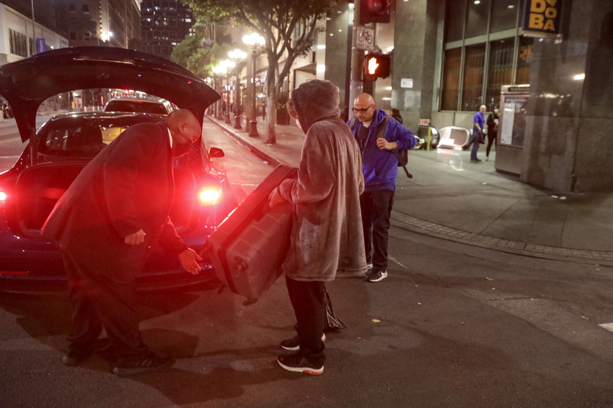 A homeless person leaves for a shelter by Uber, arranged by People Assisting the Homeless