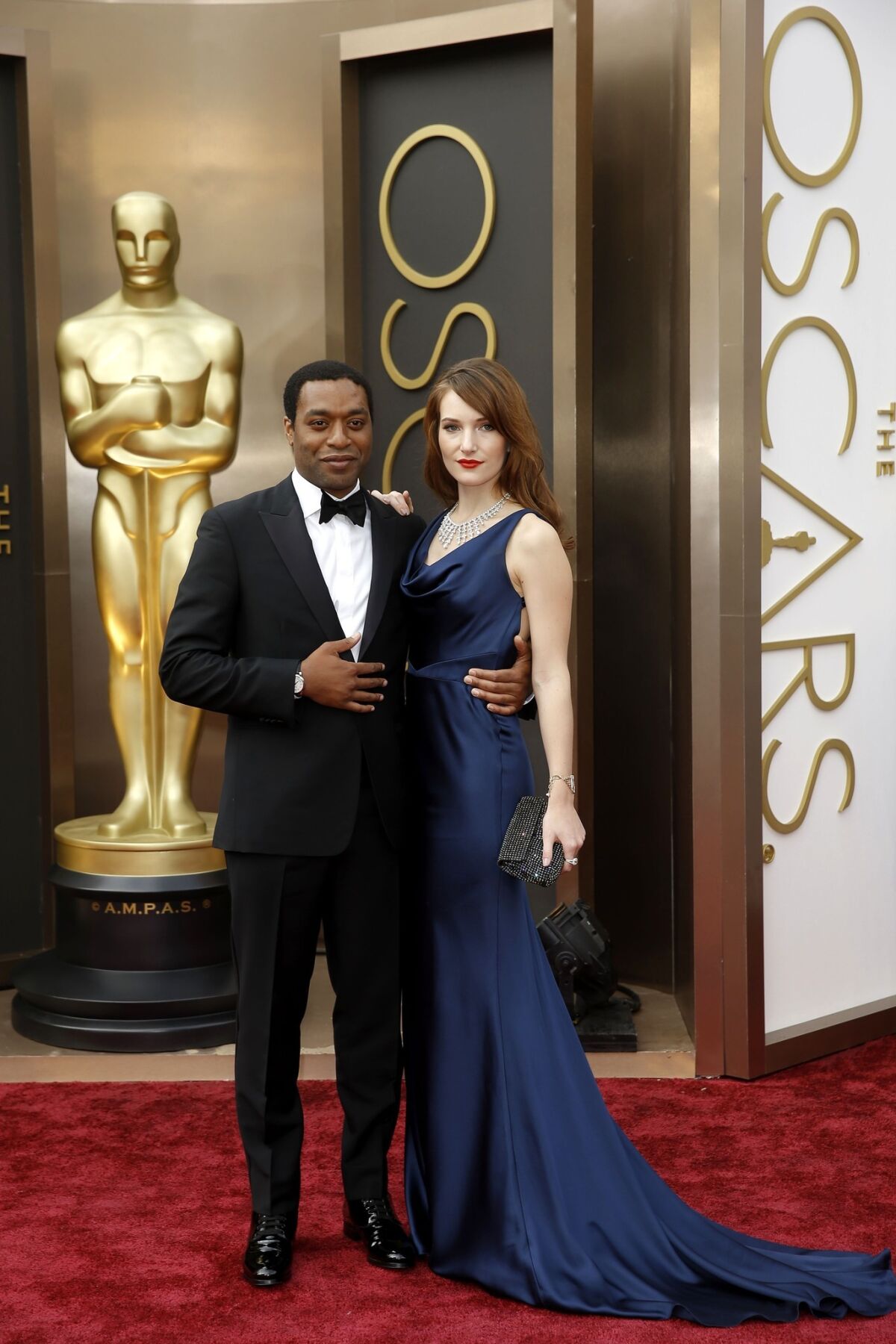 Chiwetel Ejiofor (pictured with Sari Mercer) has a sister, Zain Asher, who works for CNN and took time to record a special message for her brother. E! News played the message for the lead actor nominee Ejiofor, who seemed visibly moved by watching the video live on the red carpet.