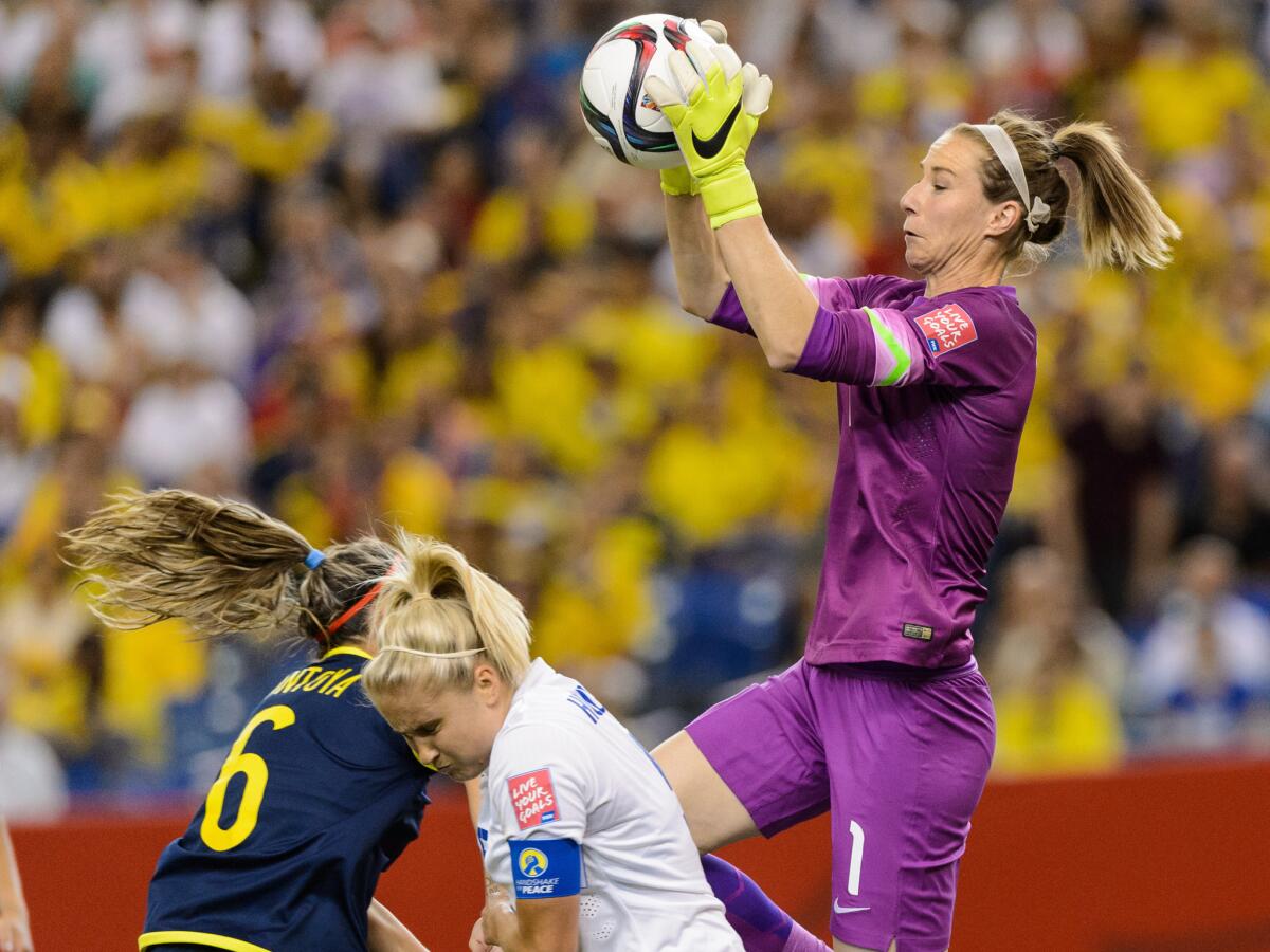 England goalkeeper Karen Bardsley jumps for the ball during her team's 2-1 victory over Colombia in a Group F match Wednesday at the Women's World Cup in Montreal.