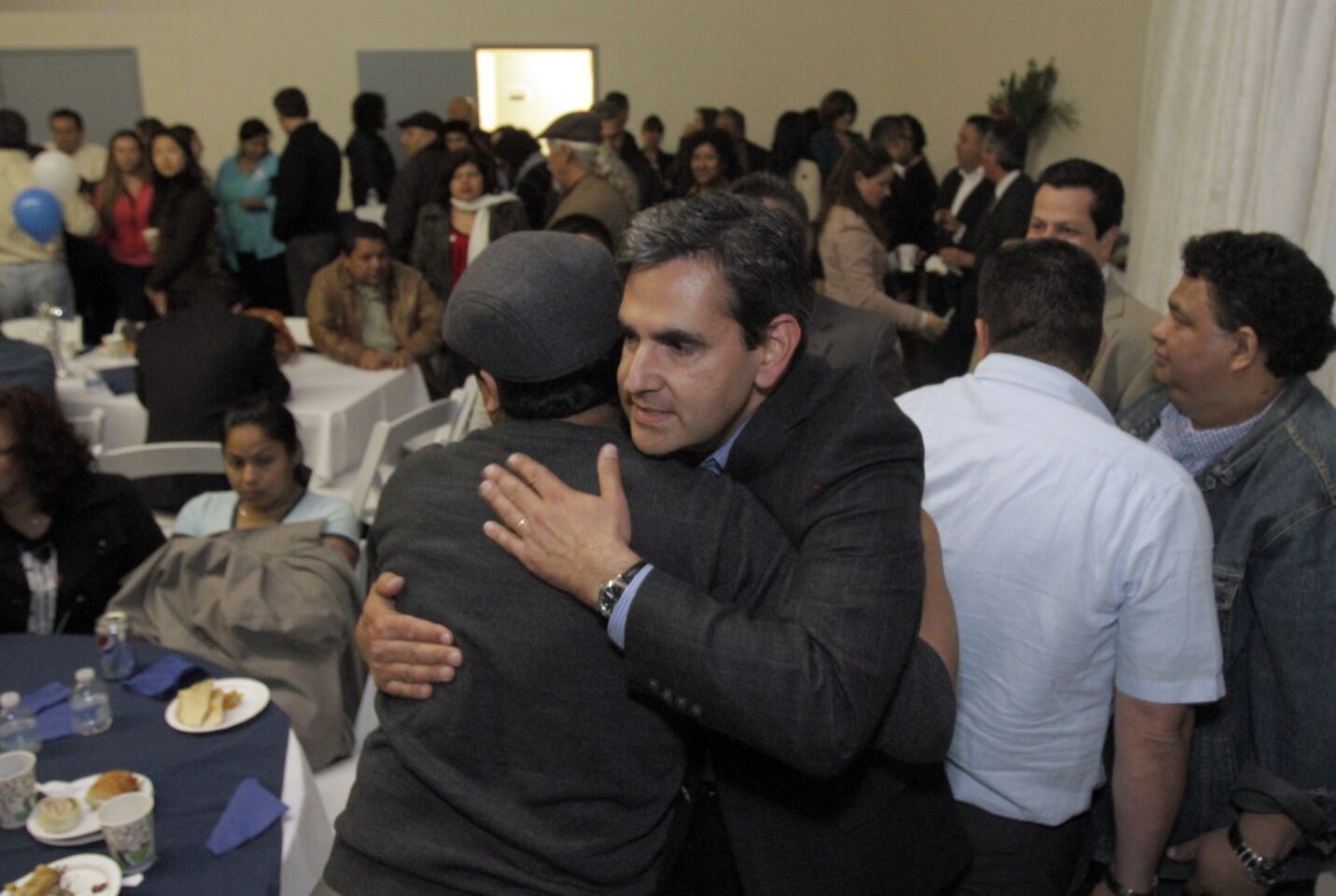 Jose Gardea, candidate for L.A. City Council District 1, is greeted by his supporters at his election-night party in Los Angeles.