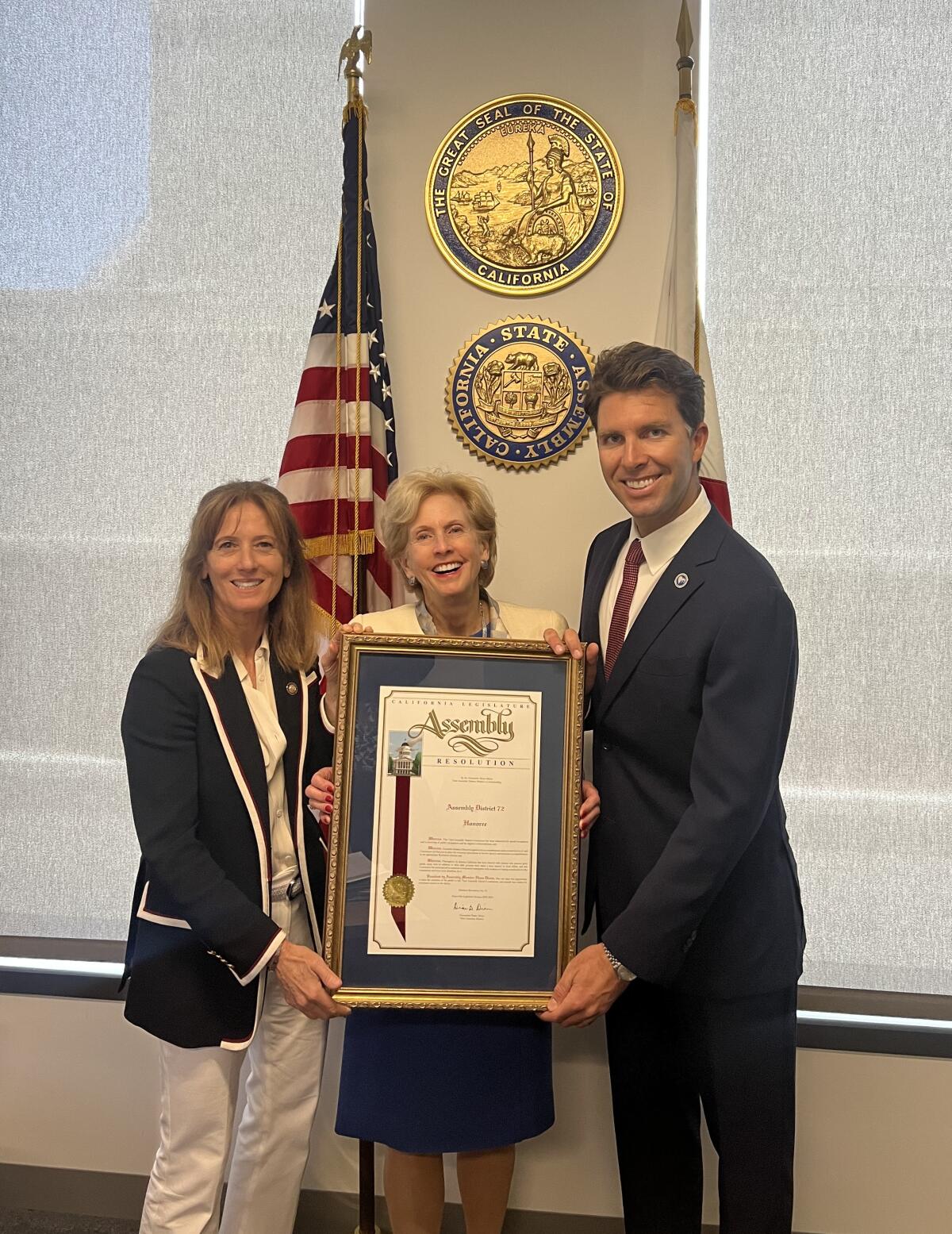 Newport Beach Councilwoman Robyn Grant, Assemblywoman Diane Dixon and Jon Langford, FONBAS president.