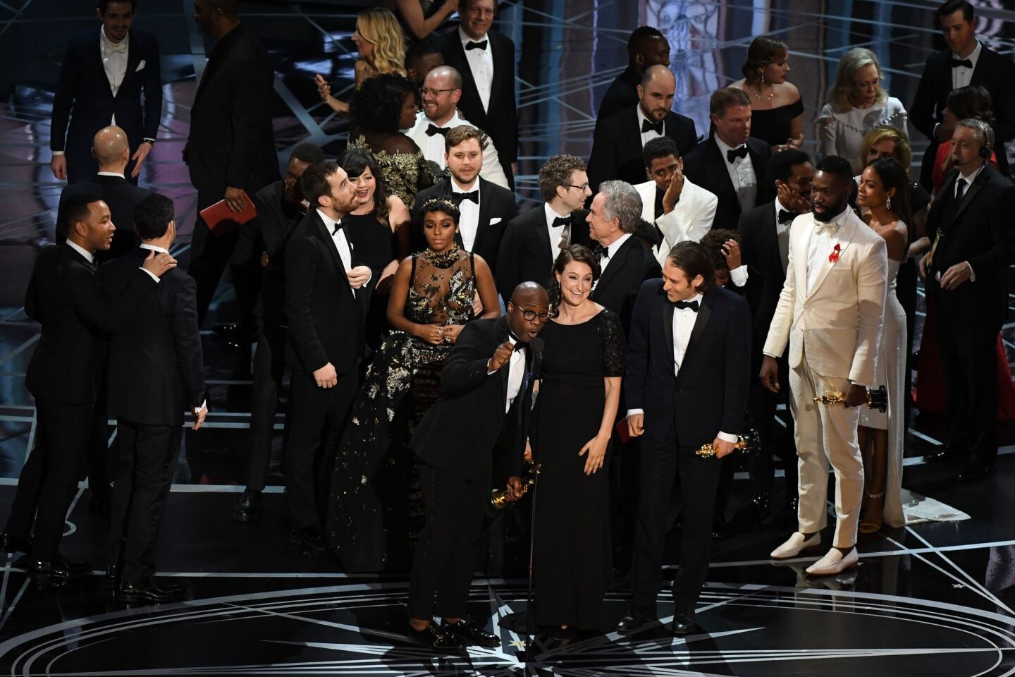 Cast and crew of both "Moonlight" and "La La Land" are onstage.